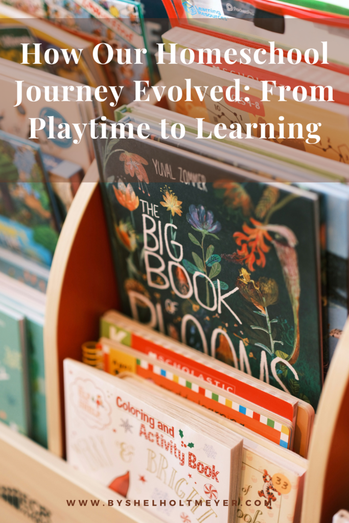 Close up of books on a magazine rack with a text overlay showing the title of the blog post: 'How Our Homeschool Journey Evolved: From Playtime to Learning'